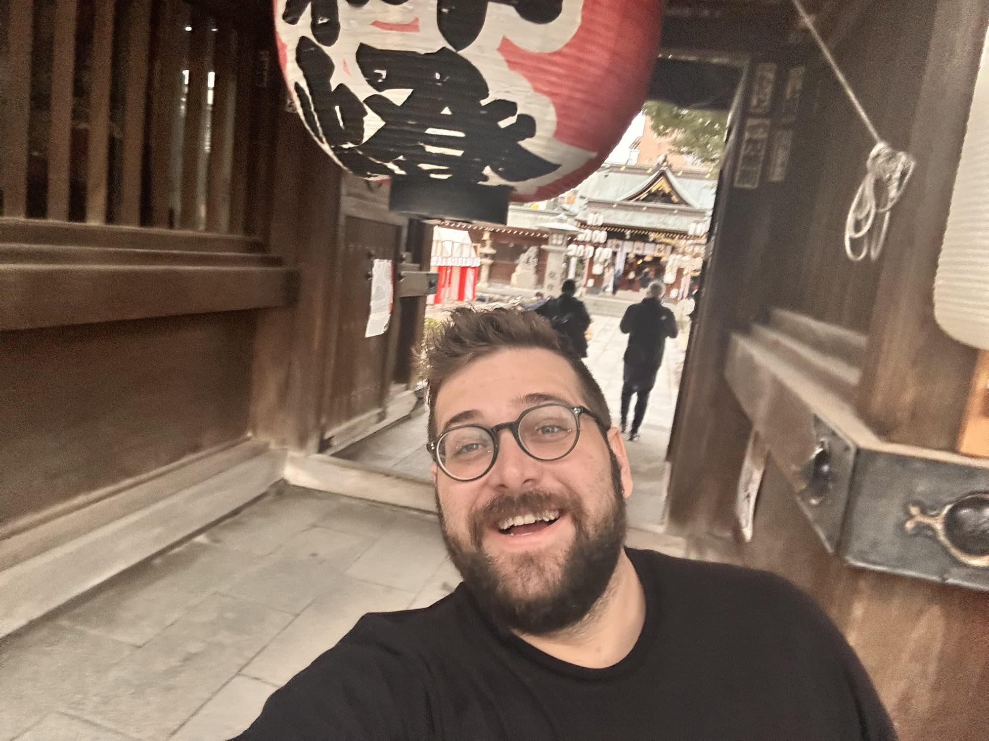 Tiago by a red lantern in Japan
