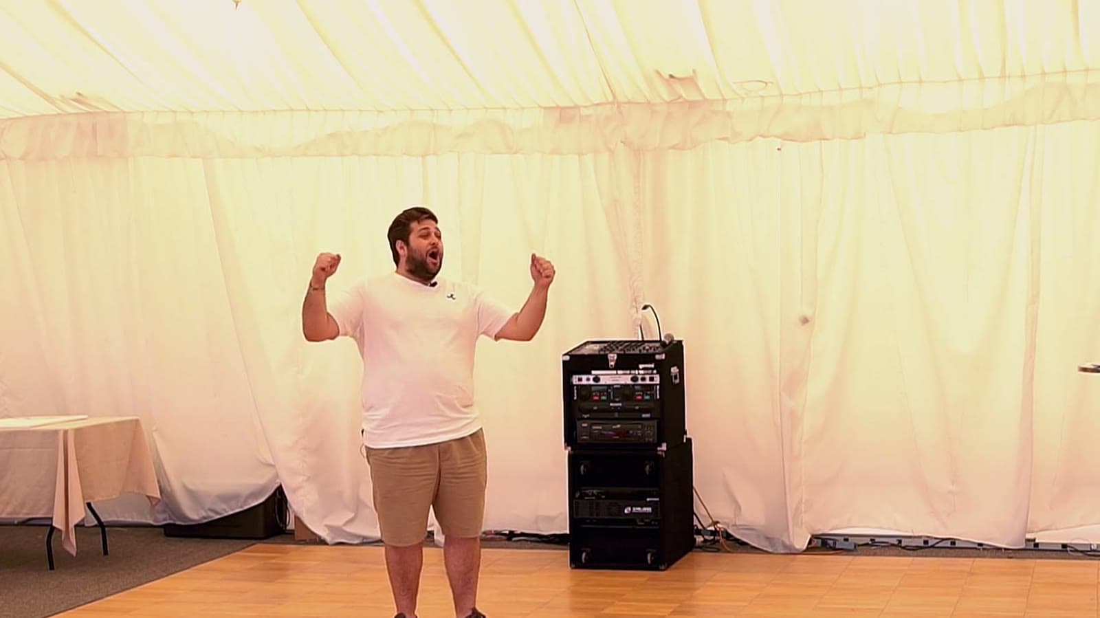 Tiago Santana speaking on stage